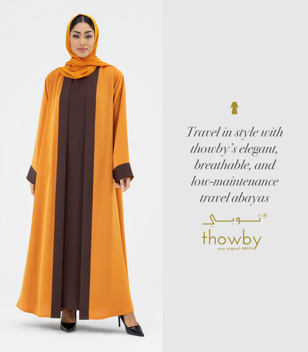 Travel abayas designed by thowby: Orange colored two toned abaya worn by a woman