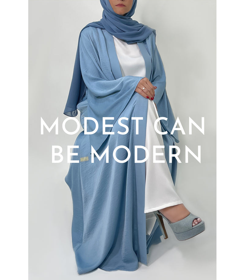 Underneath the abaya, there's a different story! - Blue Abaya