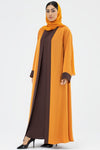Woman wearing a Two-toned Orange Colored Abaya