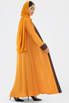 Woman wearing a Two-toned Orange Colored Abaya
