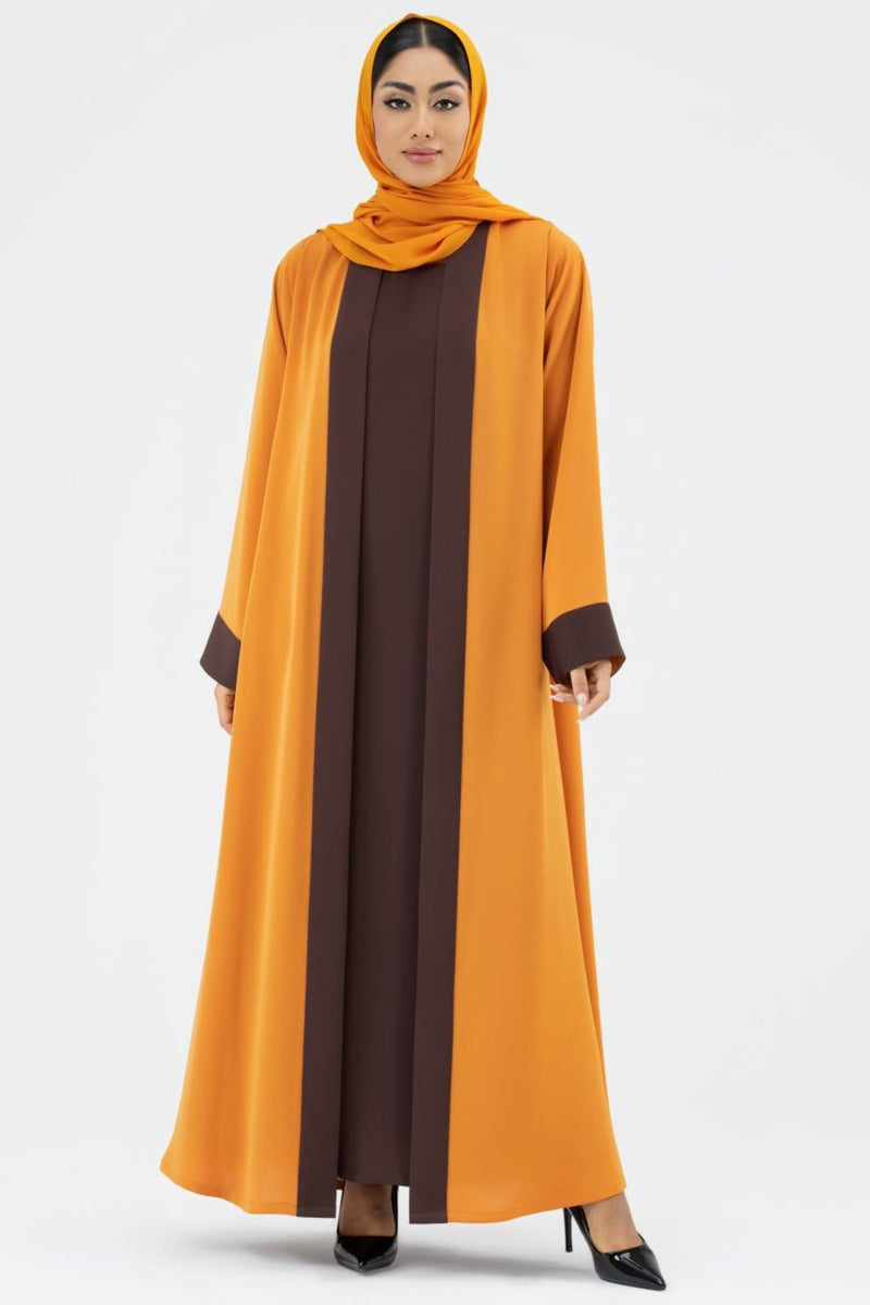 Woman wearing a Two-toned Orange Colored Abaya