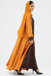 Woman wearing a Two-toned Orange Colored Abaya