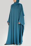 Left image Rebecca Turquoise Bisht Abaya and under abaya dress thowby Dubai