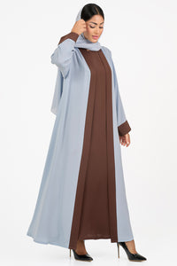 Light blue abaya over a brown dress