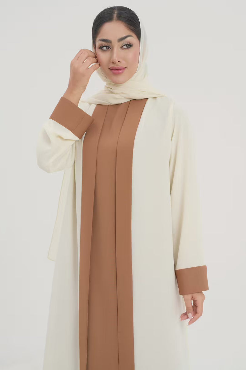 Rana Abaya in a two-toned off-white and camel color abaya video