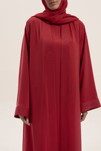 Close up Shot of a Red Embroidered Abaya