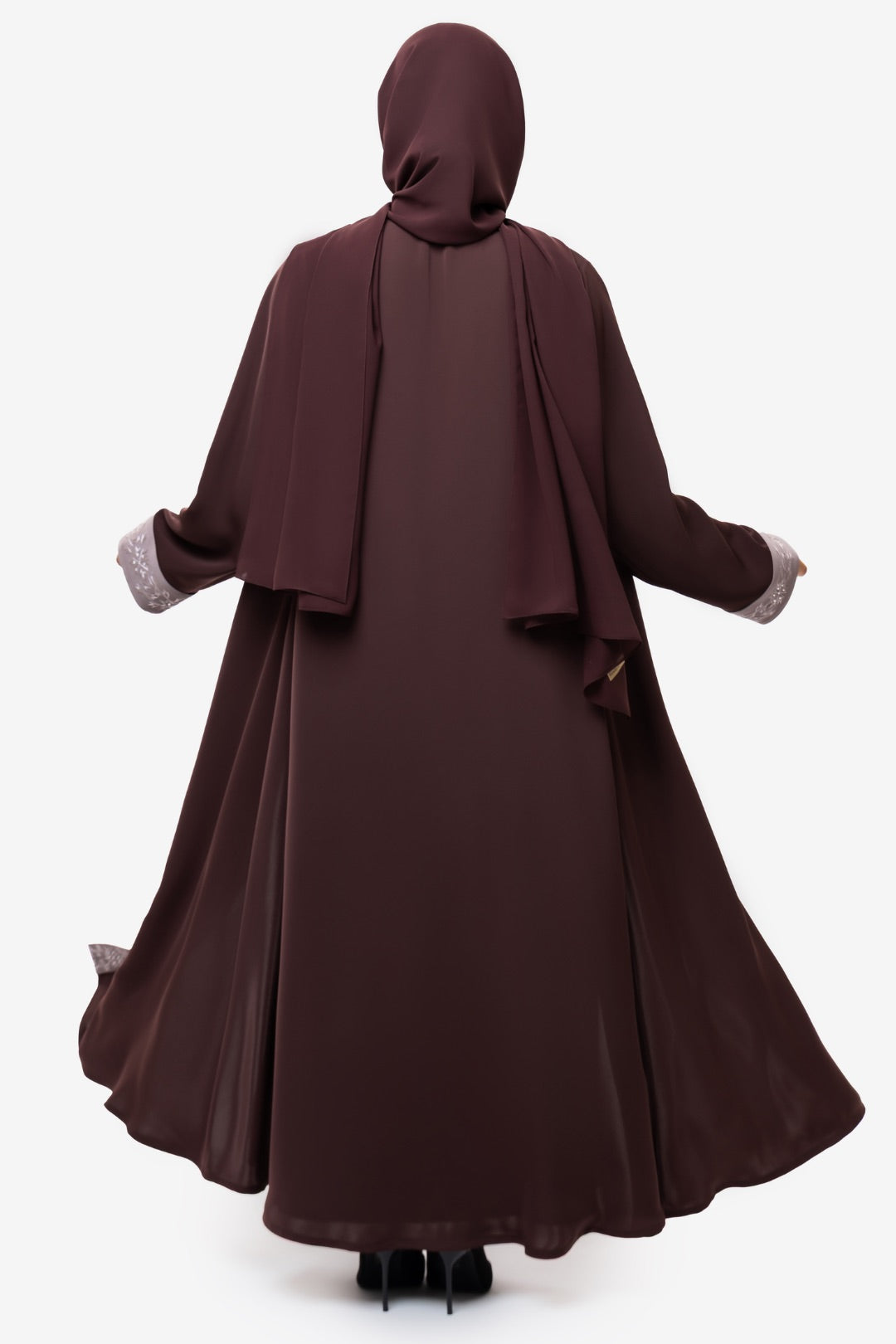 Woman wearing the Honia Abaya in elegant brown back view