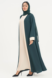 Marmar Abaya flowy silhouette standing facing left, elegant style