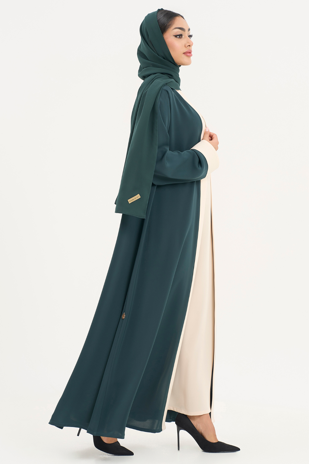 Marmar Abaya two-tone modest abaya design standing facing right, elegant style